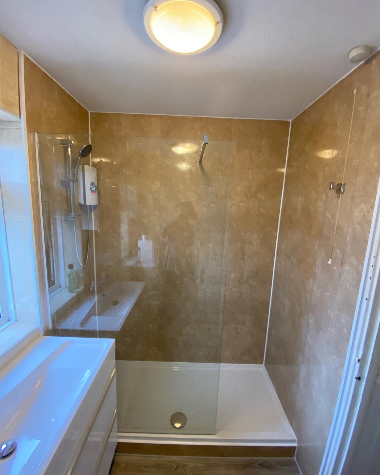 Travertine wet room with walk-in shower